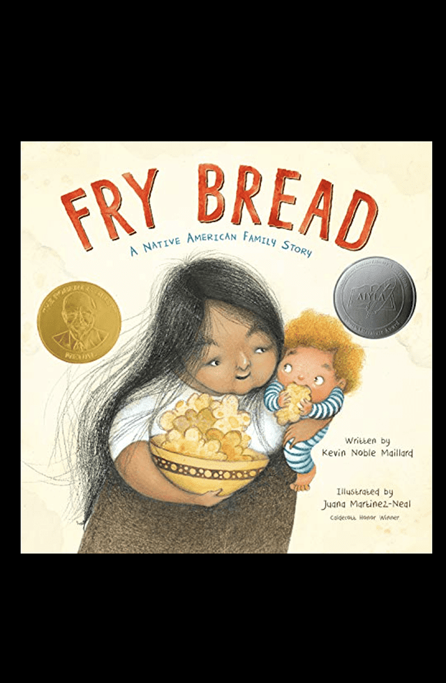 Book cover for "fry bread: a native american family story" featuring a young girl holding a baby and a bowl of fry bread, with award medals displayed.