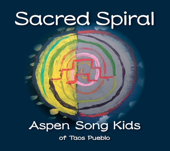 Album cover for "sacred spiral" by aspen song kids of taos pueblo featuring a multicolored spiral design on a dark blue background.