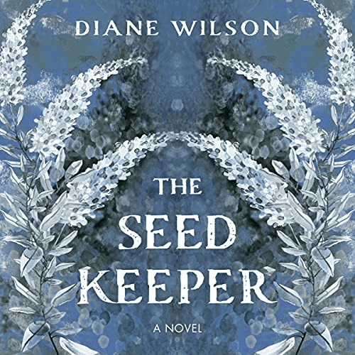 Book cover of "the seed keeper" by diane wilson featuring symmetrical floral and leaf designs in white and grey tones on a blue background.