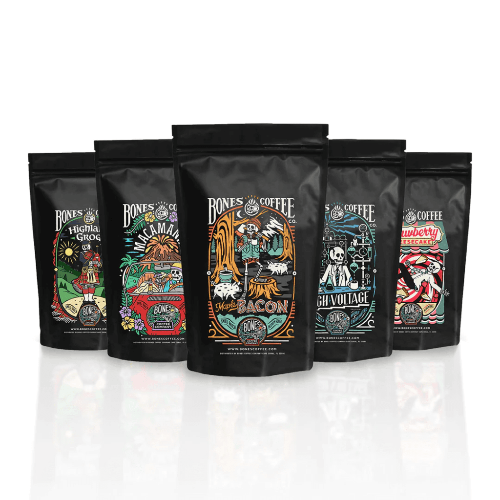 Five bags of bones coffee company flavored coffee, featuring unique, colorful designs, arrayed in a row on a white background.